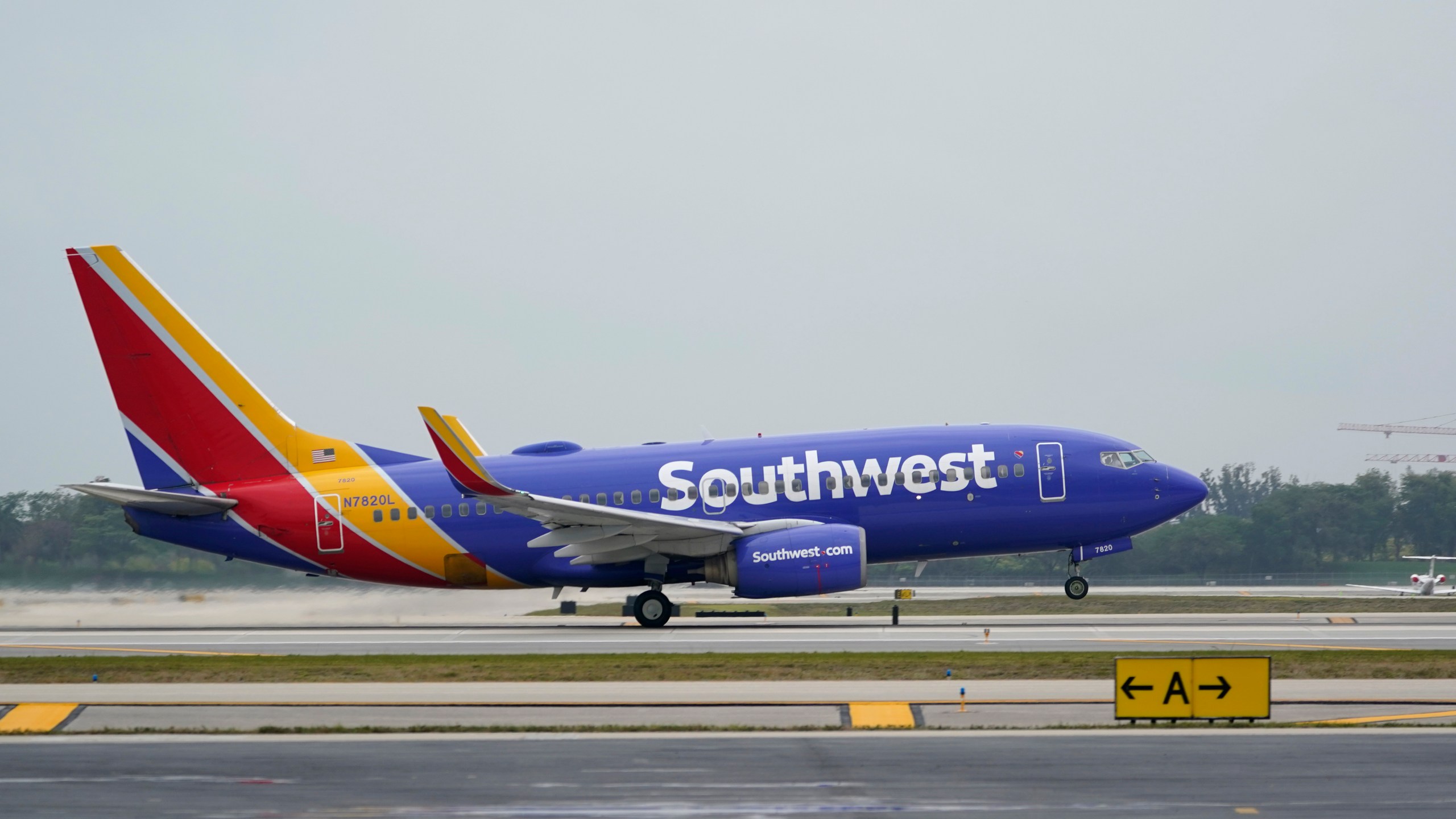 In this April 20, 2021 file photo, a Southwest Airlines Boeing 737 passenger plane takes off from Fort Lauderdale-Hollywood International Airport in Fort Lauderdale, Fla. Southwest Airlines is pushing back plans to resume selling alcohol on flights after a recent increase in unruly passengers. The airline planned to start selling booze on some flights next month. But on Friday, May 28, the airline said it was delaying the move. (AP Photo/Wilfredo Lee)