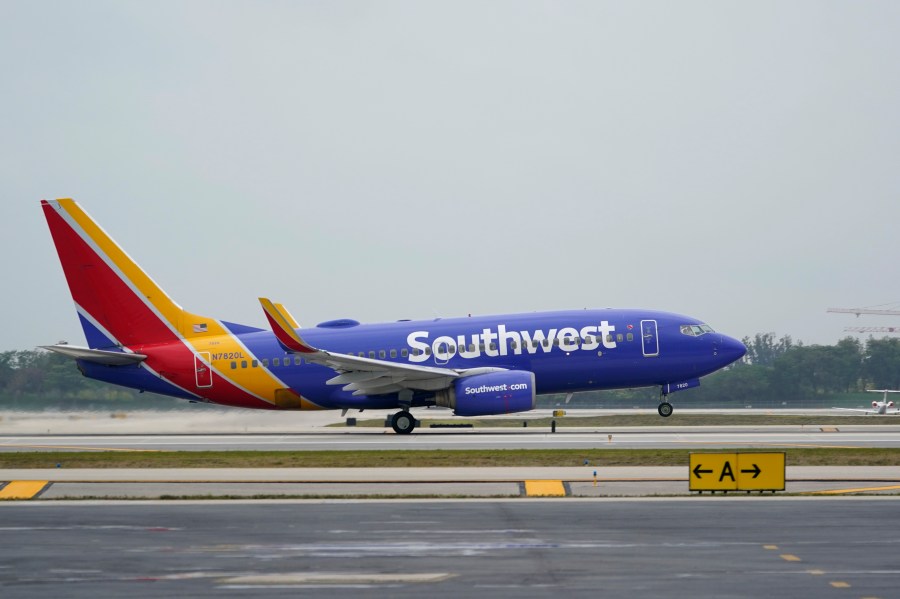 In this April 20, 2021 file photo, a Southwest Airlines Boeing 737 passenger plane takes off from Fort Lauderdale-Hollywood International Airport in Fort Lauderdale, Fla. Southwest Airlines is pushing back plans to resume selling alcohol on flights after a recent increase in unruly passengers. The airline planned to start selling booze on some flights next month. But on Friday, May 28, the airline said it was delaying the move. (AP Photo/Wilfredo Lee)