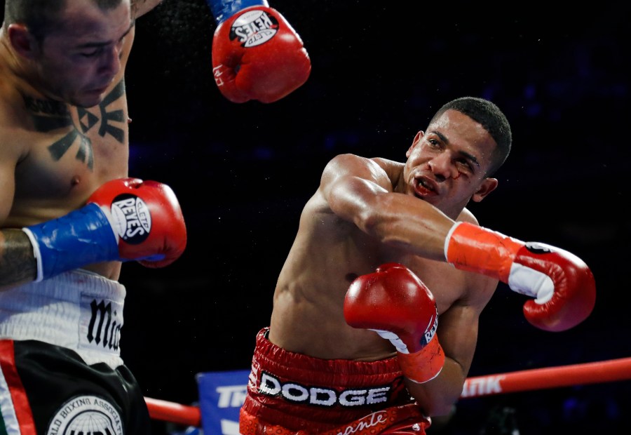 In this April 20, 2019 file photo, Puerto Rico's Felix Verdejo, right, punches Costa Rica's Bryan Vazquez during the fifth round of a lightweight boxing match in New York. Verdejo has turned himself in to federal agents on Saturday, May 1, 2021, just hours after authorities identified the body of his 27-year-old lover Keishla Rodríguez in a lagoon in the U.S. territory, a couple of days after she was reported missing. (AP Photo/Frank Franklin II, File)