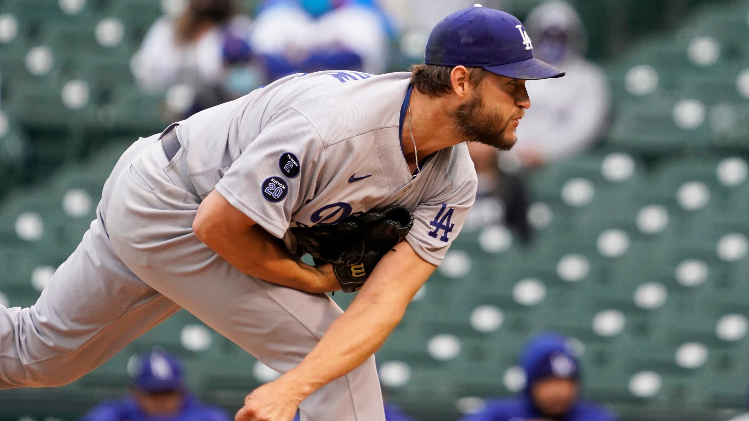 Los Angeles Dodgers starting pitcher Clayton Kershaw throws the ball against the Chicago Cubs during the first inning of the first baseball game of a doubleheader Tuesday, May, 4, 2021, in Chicago. (AP Photo/David Banks)