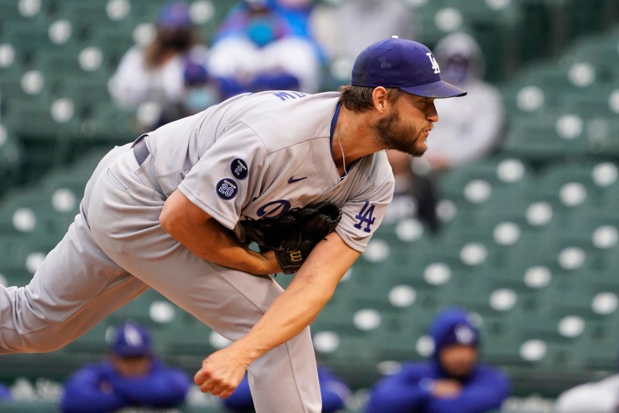 Los Angeles Dodgers starting pitcher Clayton Kershaw throws the ball against the Chicago Cubs during the first inning of the first baseball game of a doubleheader Tuesday, May, 4, 2021, in Chicago. (AP Photo/David Banks)