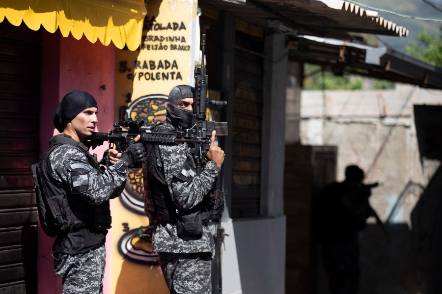 Police conduct an operation against alleged drug traffickers in the Jacarezinho favela of Rio de Janeiro, Brazil, on May 6, 2021. (Silvia Izquierdo / Associated Press)