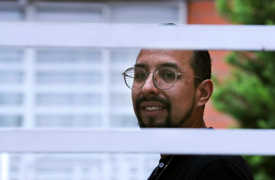 Erik Bravo, 34, a survivor of Monday's subway collapse, poses for a photo in Mexico City on Thursday, May 6, 2021. Bravo is not exaggerating when he says that he could have been one of those who fell and, perhaps, would have lost his life when the overpass of the subway collapsed, and two of its bright orange carriage cars suddenly fell into a void. (Marco Ugarte / Associated Press)