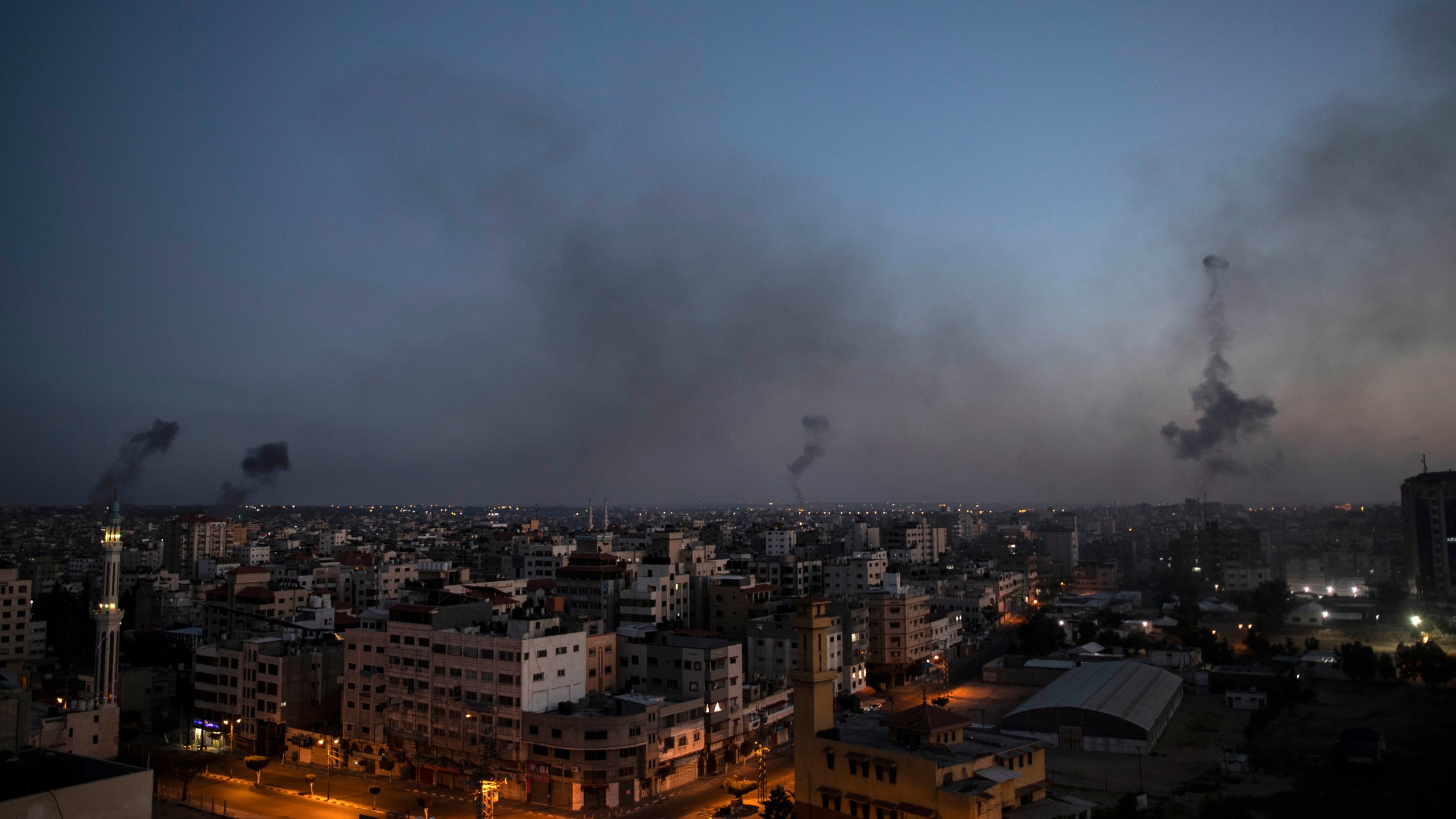 Black smoke rise following Israeli airstrikes on Gaza City, Wednesday, May 12, 2021. (AP Photo/Khalil Hamra)