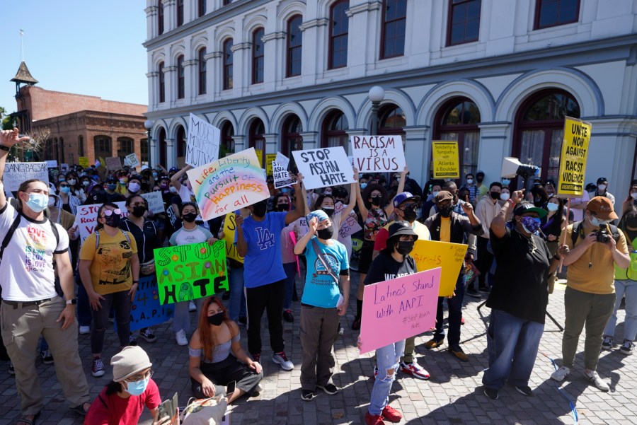 In this March 27, 2021, file photo, demonstrators rally against Asian hate crimes in El Pueblo de Los Angeles, Los Angeles Plaza Park. (AP Photo/Damian Dovarganes, File)