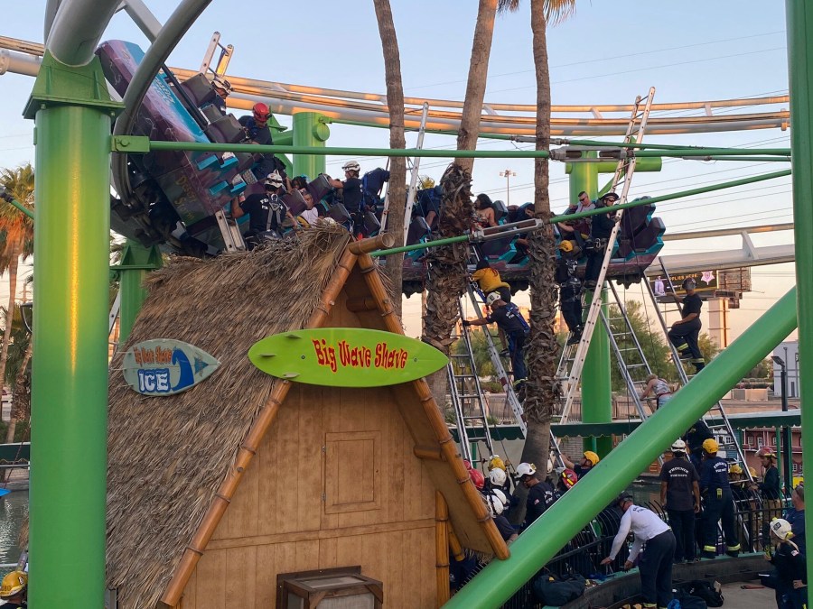 This photo provided by Glendale Fire Department responders rescuing people stuck on a roller coaster at Castles N’ Coasters on Saturday, May 15, 2021 in Phoenix. (Glendale Fire Department via AP)