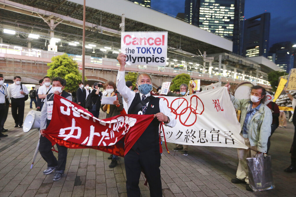 In this May 17, 2021, file photo, demonstrators protest against the Tokyo 2020 Olympics in Tokyo. (AP Photo/Koji Sasahara, File)