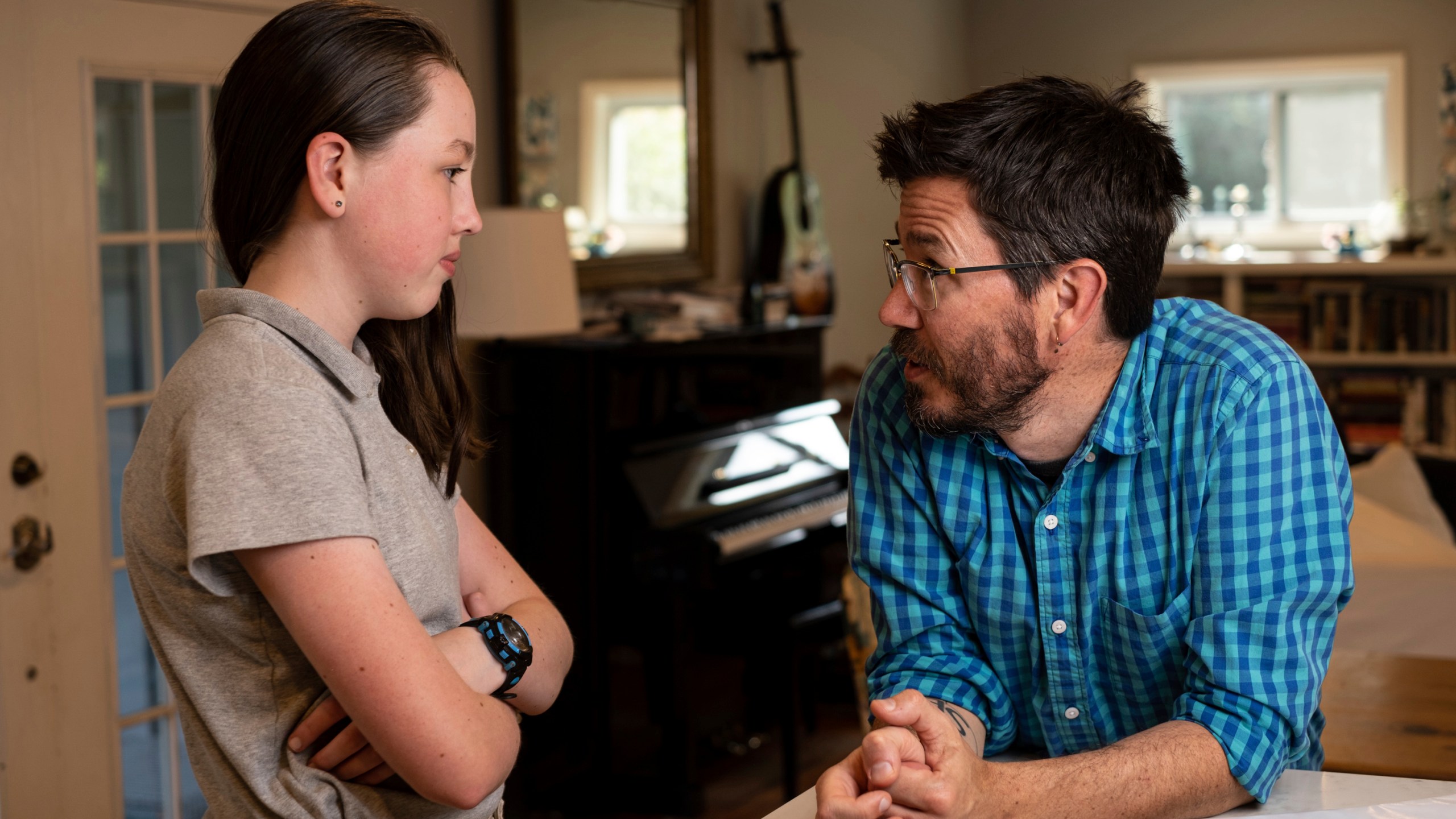 Jay Wamsted, right, and his daughter, Kira, are photographed on Thursday, May 20, 2021 in Smyrna, Ga. Wamsted, who is an 8th grade math teacher allowed his daughter to skip testing this year. (AP Photo/Ben Gray)