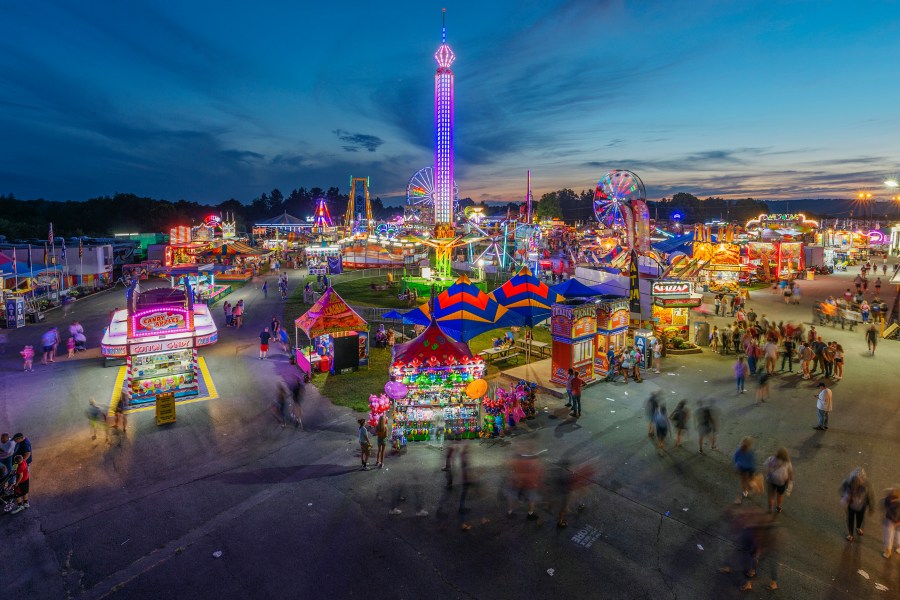 In this Aug. 9, 2018, file photo, fair-goers attend The State Fair of West Virginia at the State Fairgrounds in Fairlea, W.Va. West Virginia has seen a higher percentage of residents depart than any other state in the past decade. (Craig Hudson/Charleston Gazette-Mail via AP, File)