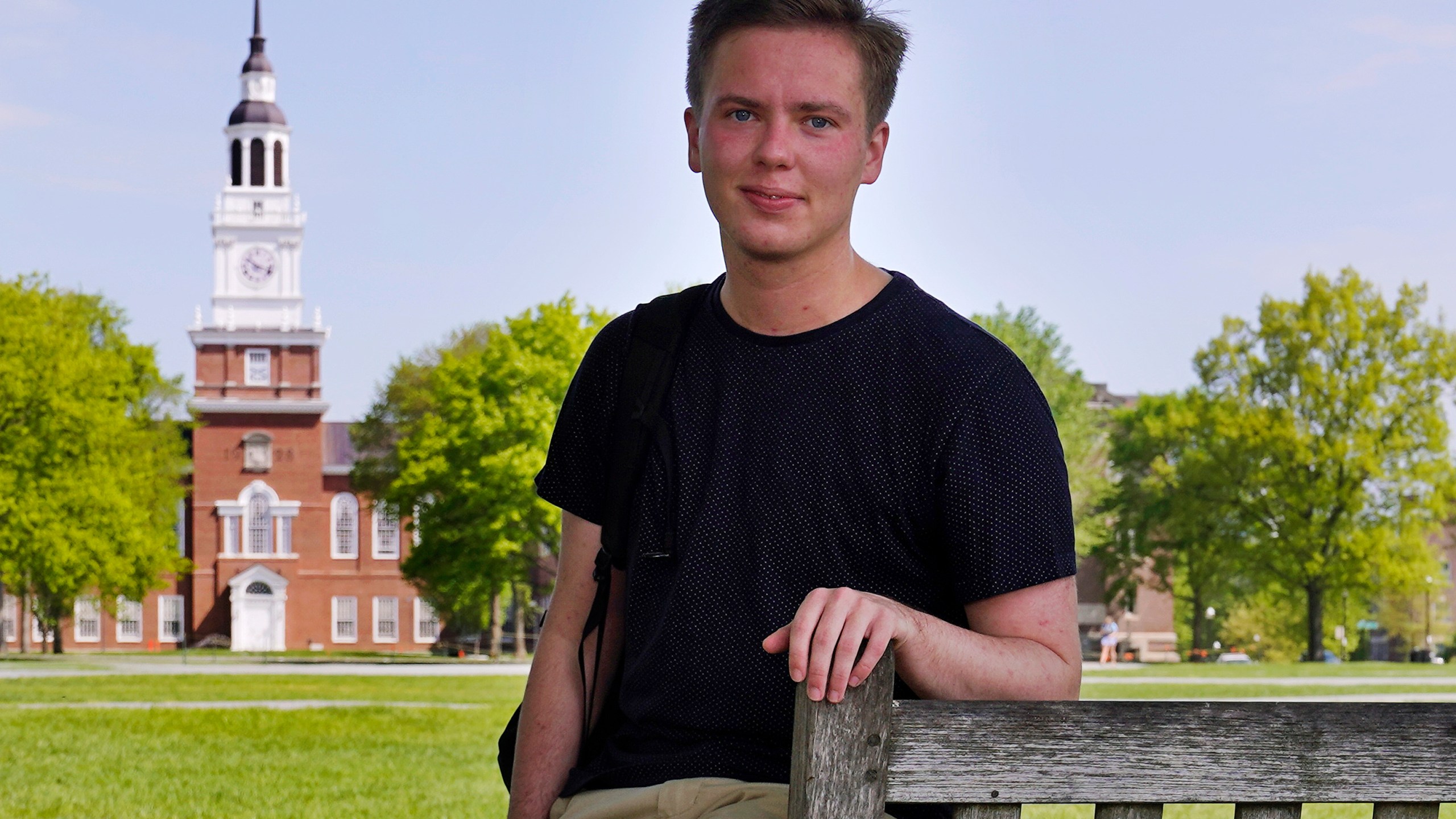 Colin Goodbred, a 22-year-old transgender student, poses on the campus of Dartmouth College, Friday, May 21, 2021, in Hanover, N.H. (AP Photo/Charles Krupa)