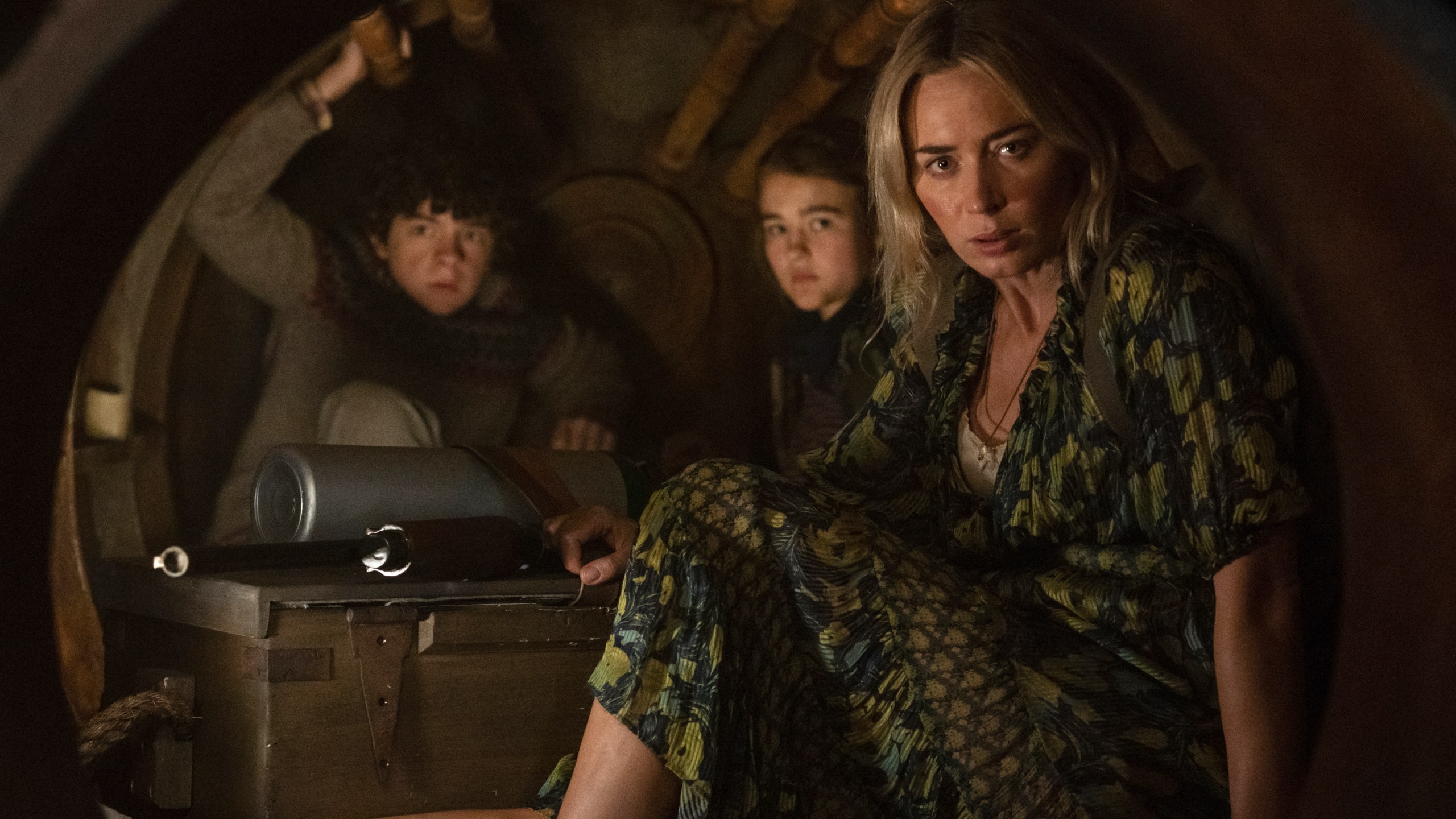 This image released by Paramount Pictures shows, from left, Noah Jupe, Millicent Simmonds and Emily Blunt in a scene from "A Quiet Place Part II." (Jonny Cournoyer/Paramount Pictures via AP)