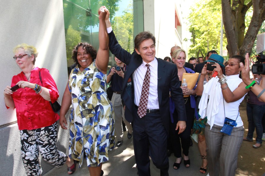 In this April 30, 2012, file photo, Yvonne Walker, president of the Service Employees International Union Local 1000, leads a walk for health with Dr. Mehmet Oz, in downtown in Sacramento, Calif. The president of California's largest state employees union has been ousted from the post she held for 13 years and replaced by a candidate who promises to end the organization's political involvement while bolstering its membership, according to results from a low-turnout election posted by the union. Under Walker's leadership since 2008, SEIU Local 1000 was a thorn in the side of the state's last Republican governor, Arnold Schwarzenegger, but grudgingly negotiated other austerity moves with his two Democratic successors. (AP Photo/Rich Pedroncelli, File)