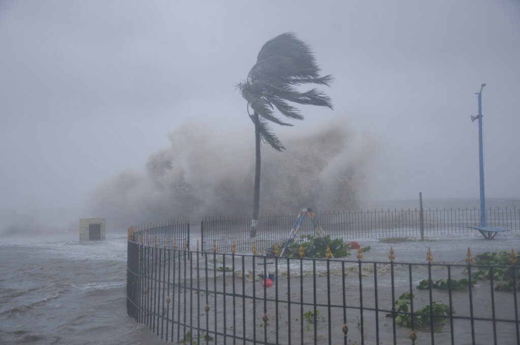 Heavy winds and sea waves hit the shore at the Digha beach on the Bay of Bengal coast as Cyclone Yaas intensifies in West Bengal state, India, Wednesday, May 26, 2021. (AP Photo/Ashim Paul)