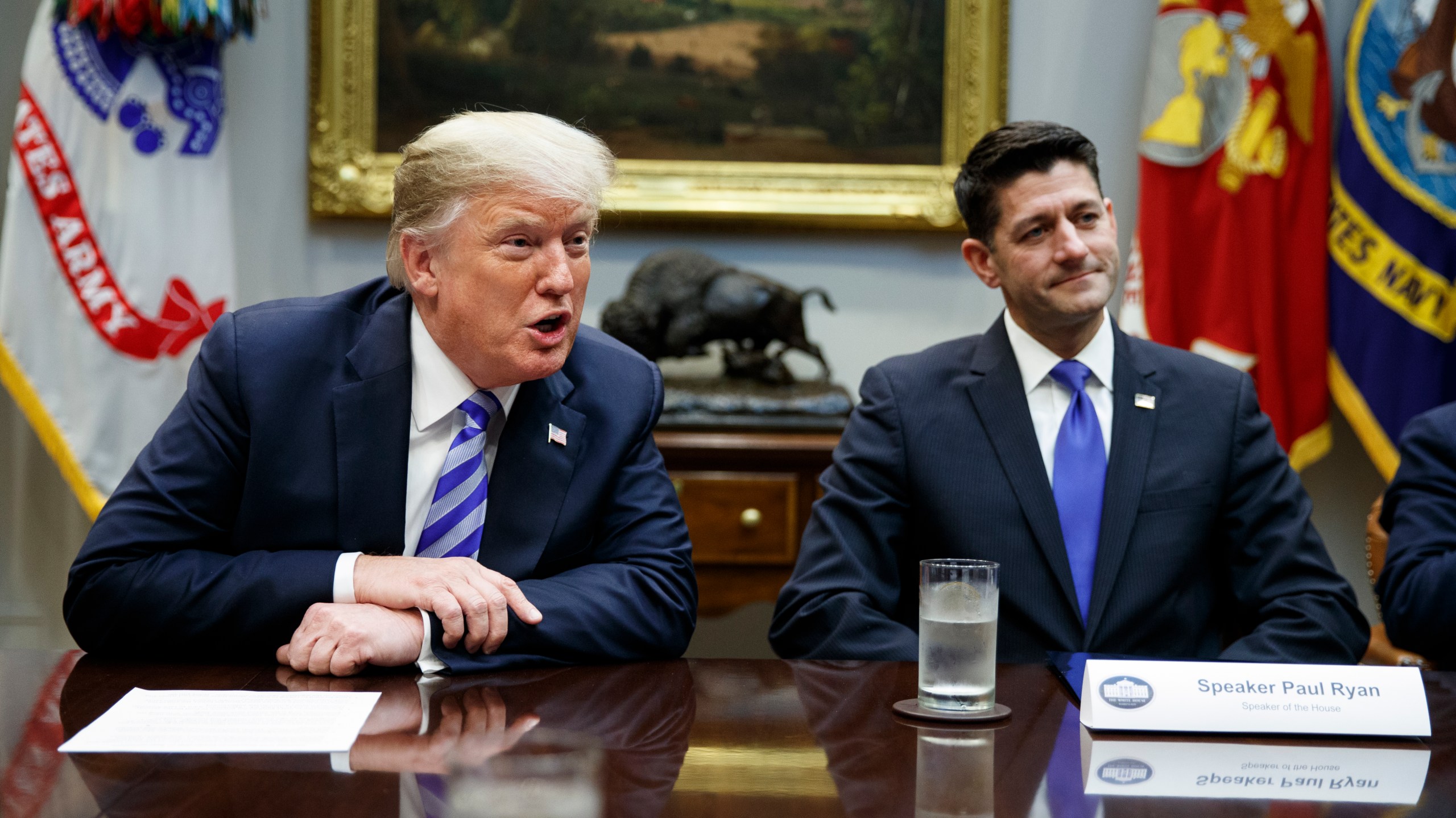 In this Sept. 5, 2018, file photo, then-Speaker of the House Paul Ryan, R-Wis., listens to President Donald Trump speak during a meeting with Republican lawmakers in the Roosevelt Room of the White House in Washington. (AP Photo/Evan Vucci, File)