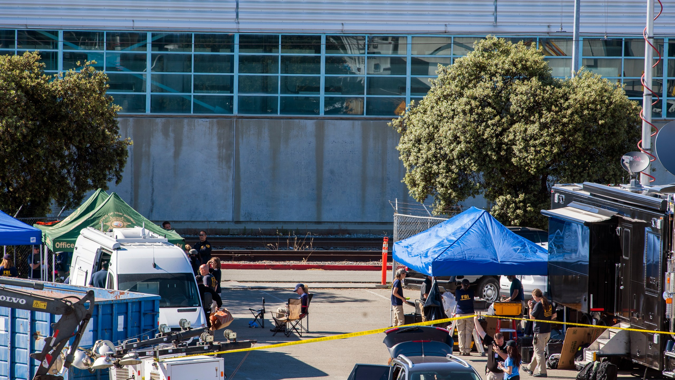 Authorities continue their investigation at Valley Transportation Authority in San Jose, Calif., Thursday, May 27, 2021, a day after a gunman killed multiple people at the rail yard. (AP Photo/Nic Coury)