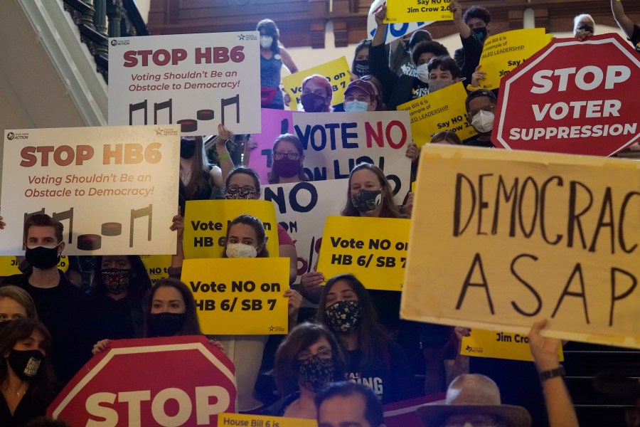 In this May 6, 2021 file photo, a group opposing new voter legislation gather outside the House Chamber at the Texas Capitol in Austin, Texas. Texas Republicans dug in Saturday, May 29, for a final weekend vote on some of the most restrictive new voting laws in the U.S., finalizing a sweeping bill that would eliminate drive-thru voting, reduce polling hours and scale back Sunday voting, when many Black churchgoers head to the polls.(AP Photo/Eric Gay, File)