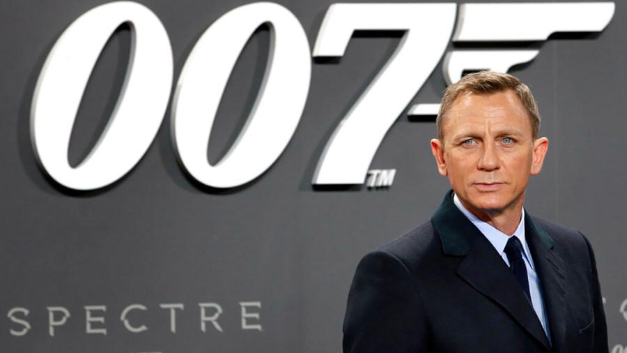 In this Oct. 28, 2015, file photo, actor Daniel Craig poses for the media as he arrives for the German premiere of the James Bond movie 'Spectre' in Berlin, Germany. Amazon, on Wednesday, May 26, 2021, is buying MGM, the movie and TV studio behind James Bond, “Legally Blonde” and “Shark Tank,” with the hopes of filling its video streaming service with more stuff to watch. (AP Photo/Michael Sohn, File)