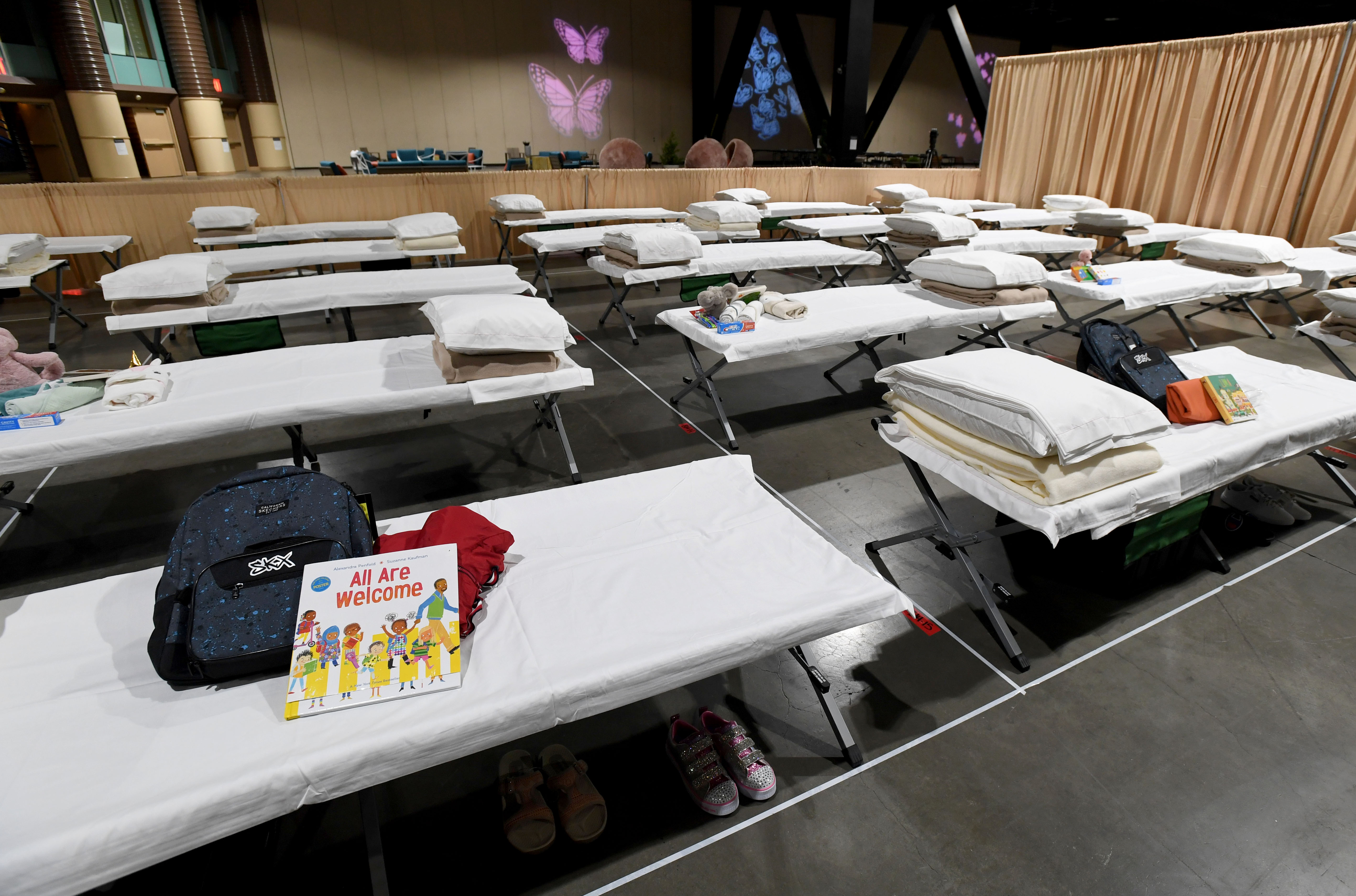 Sleeping quarters set up inside Exhibit Hall B for migrant children are shown during a tour of the Long Beach Convention Center on April 22, 2021. (Brittany Murray / Getty Images)