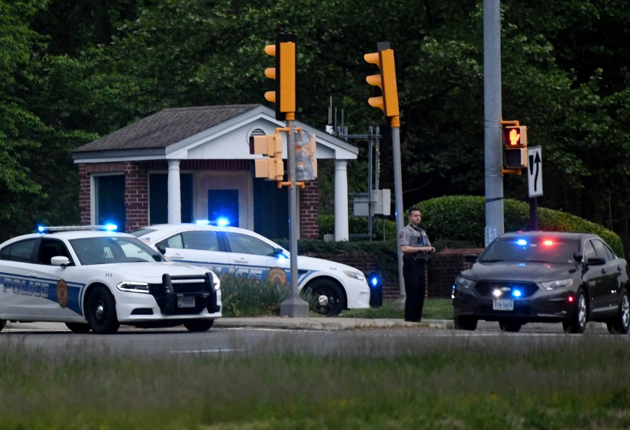 Police cars are seen outside the CIA headquarters' gate after an attempted intrusion earlier in the day in Langley, Virginia, on May 3, 2021. (Olivier Douliery / AFP / Getty Images)