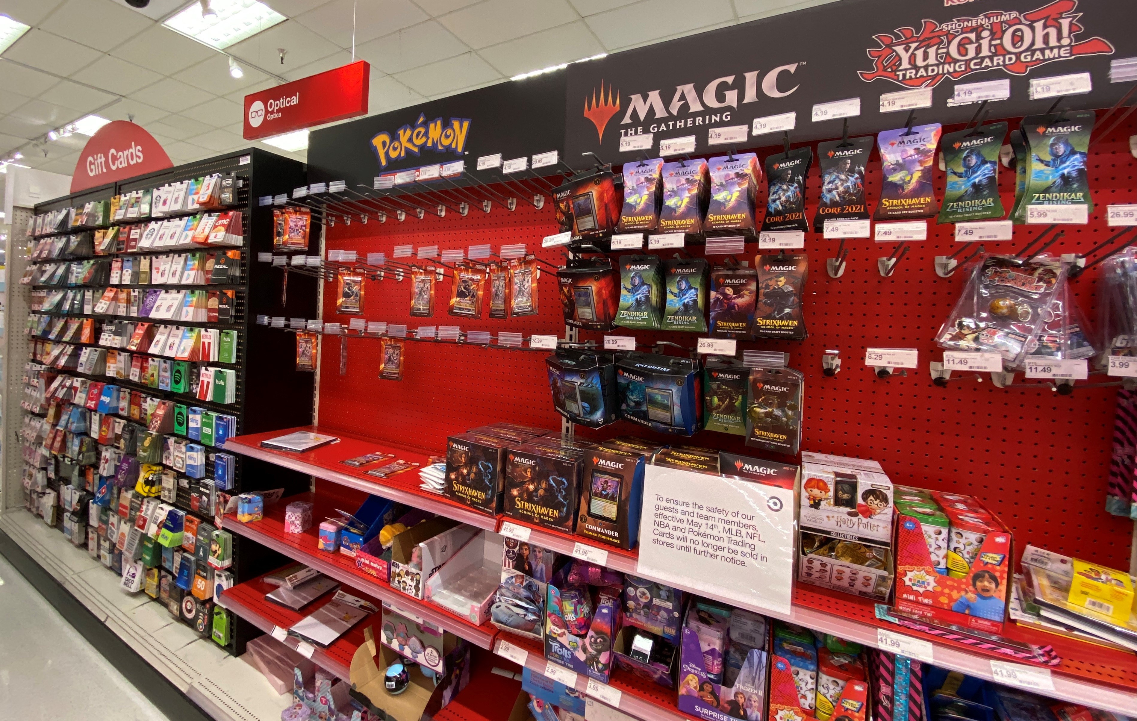 A sign warning customers that Pokemon trading cards will no longer be sold until further notice is displayed at a local Target store in Los Angeles, California on May 14, 2021. (Chris Delmas/AFP via Getty Images)