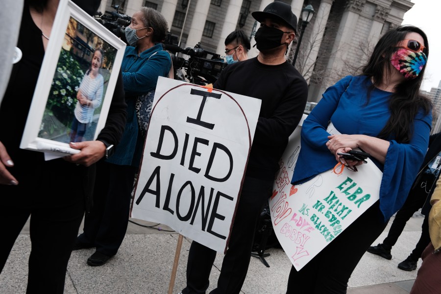 People who've lost loved ones due to COVID-19 while they were in New York nursing homes attend a protest and vigil on March 25, 2021 in New York City. ( Spencer Platt/Getty Images)