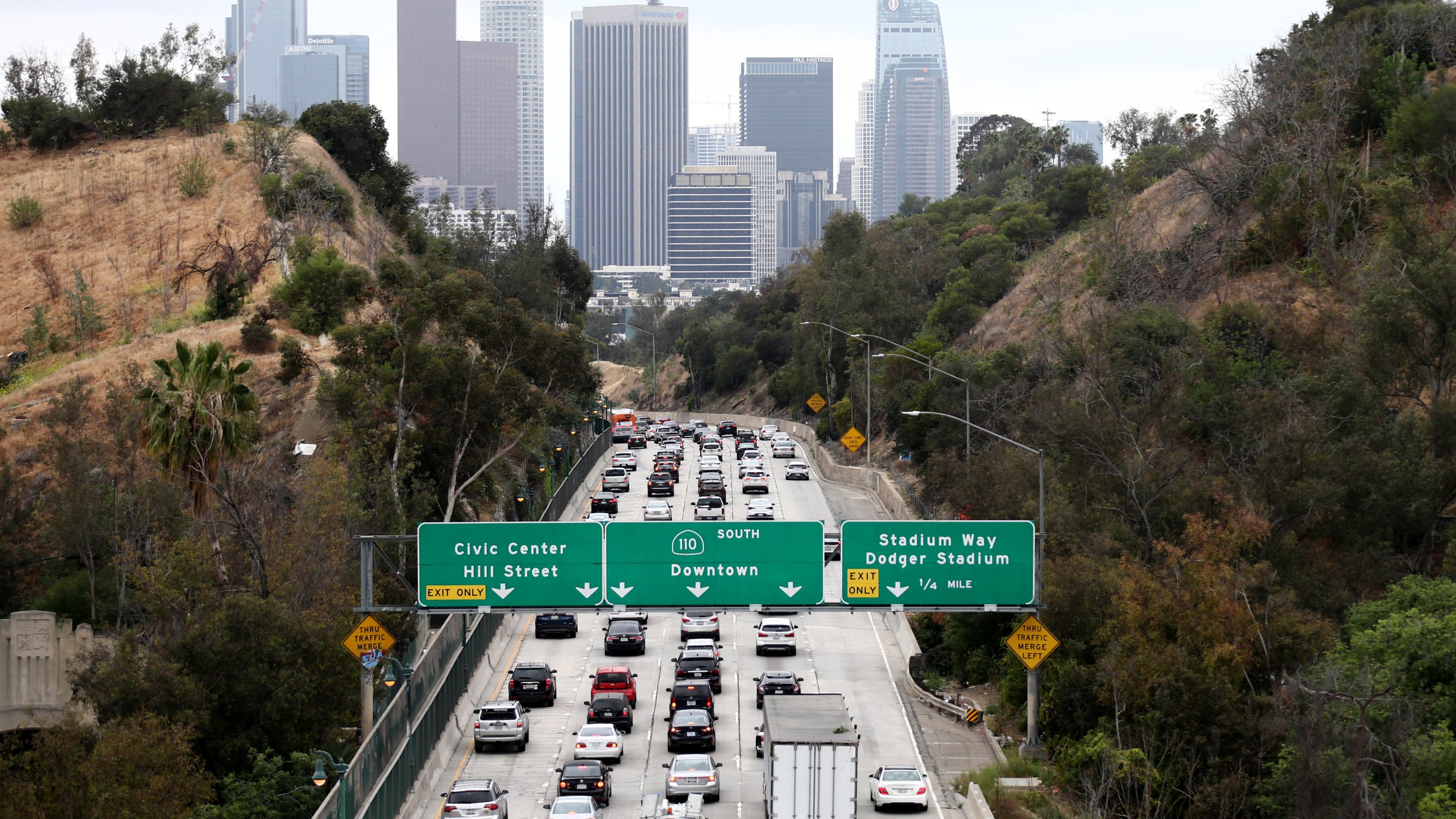 Cars make their way toward downtown L.A. on the 110 freeway during the morning commute on April 22, 2021 in Los Angeles, California. (Mario Tama/Getty Images)