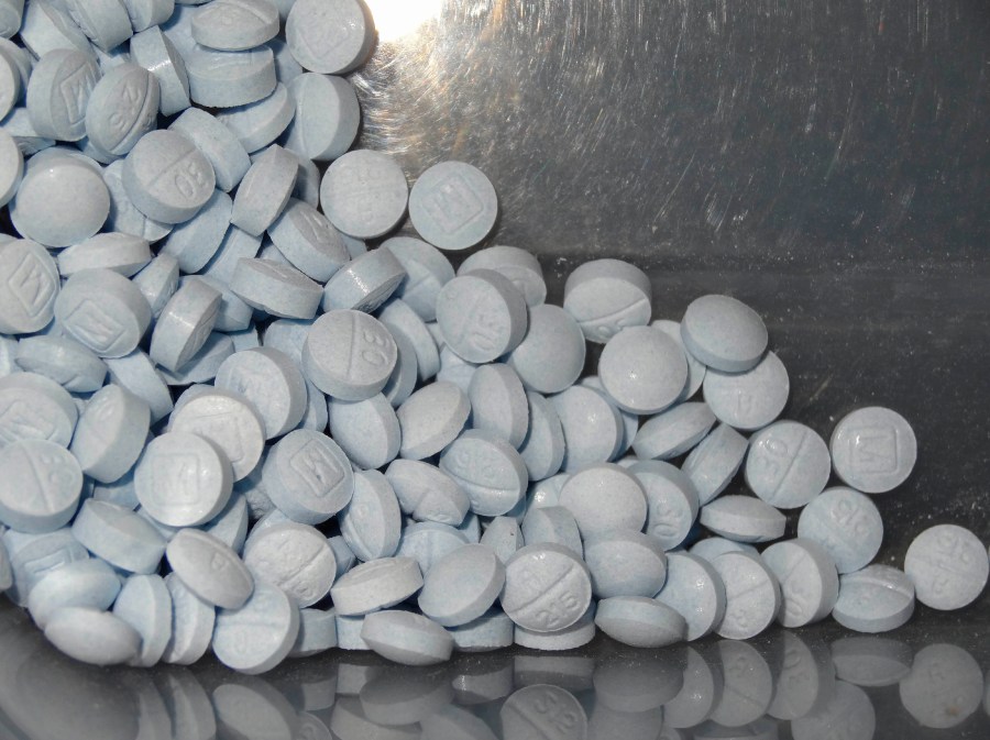 This photo provided by the U.S. Attorneys Office for Utah and introduced as evidence in a 2019 trial shows fentanyl-laced fake oxycodone pills collected during an investigation. (U.S. Attorneys Office for Utah via AP)