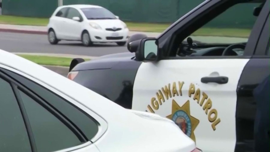 A CHP vehicle investigates one in a series of suspected BB gun attacks on the 91 Freeway. (KTLA)