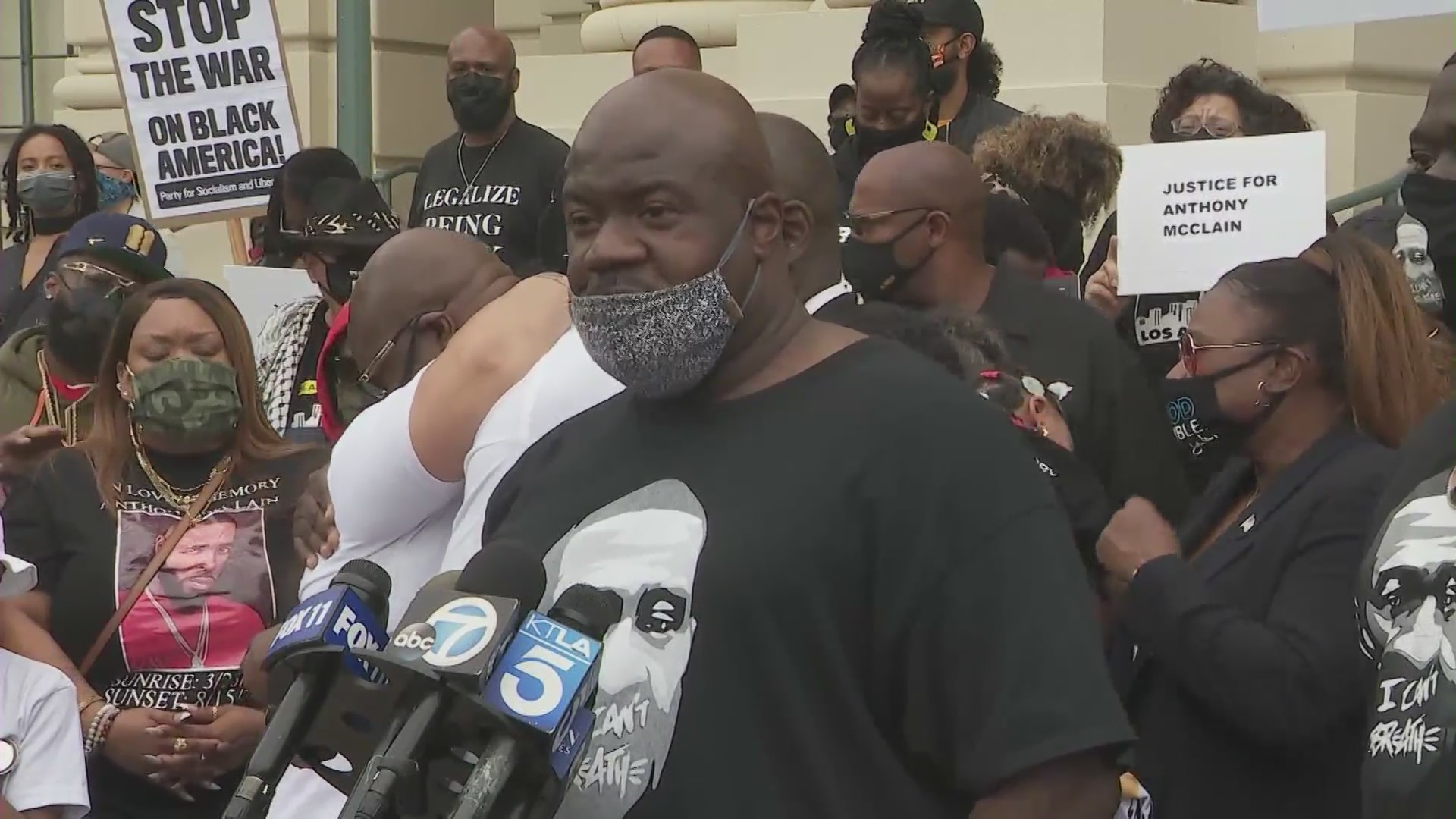 Activists outside Pasadena City Hall call for police accountability in the death of Anthony McClain on May 17, 2021. (KTLA)