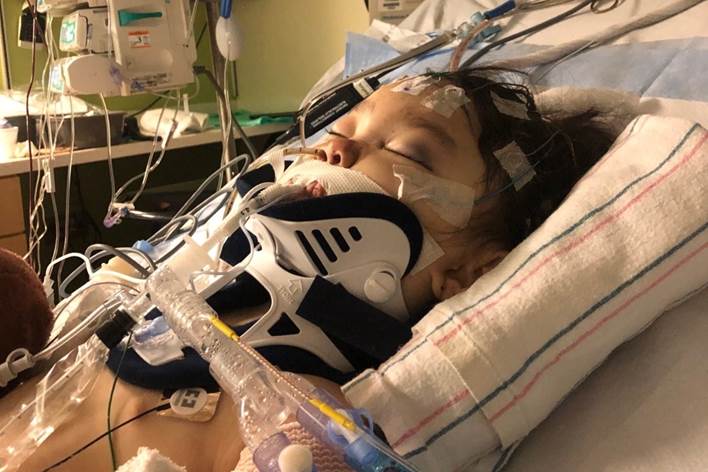 Nova Kolodny-Nagy, 4, receives treatment at a hospital after sustaining injuries to her head and body in a sledding incident with her parents on Feb. 4, 2021. Her mother, Lisa Mao, died shortly after the accident. (Courtesy of the Kolodny-Nagy family)