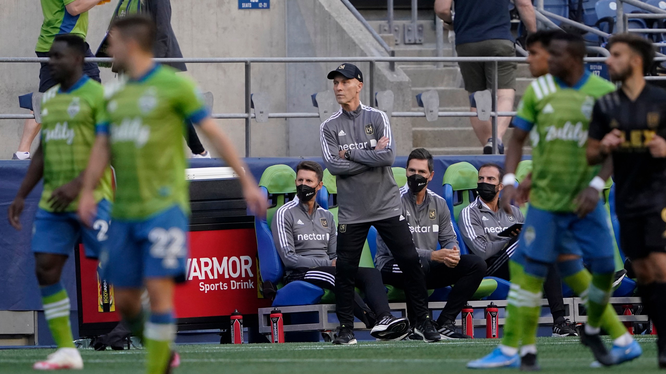 Los Angeles FC head coach Bob Bradley watches from the sideline during the second half of an MLS soccer match against the Seattle Sounders May 16, 2021, in Seattle. (Ted S. Warren/Associated Press)