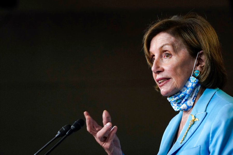 House Speaker Nancy Pelosi of Calif., talks to reporters on Capitol Hill in Washington, Wednesday, May 19, 2021, about legislation to create an independent, bipartisan commission to investigate the Jan. 6 attack on the United States Capitol Complex. (AP Photo/Susan Walsh)