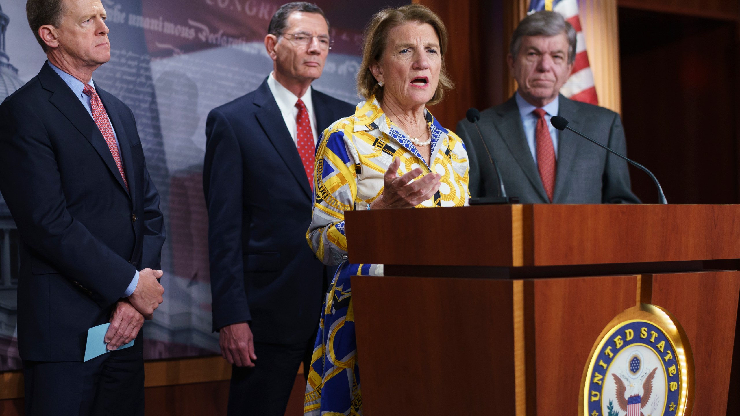 In this photo taken Thursday, May 27, 2021, Sen. Shelley Moore Capito, R-W.Va., the GOP's lead negotiator on a counteroffer to President Joe Biden's infrastructure plan, speaks at a news conference as she is joined by, from left, Sen. Pat Toomey, R-Pa., Sen. John Barrasso, R-Wyo., chairman of the Senate Republican Conference, and Sen. Roy Blunt, R-Mo., at the Capitol in Washington. Biden and the West Virginia senator will meet Wednesday afternoon to work on their differences. (AP Photo/J. Scott Applewhite)