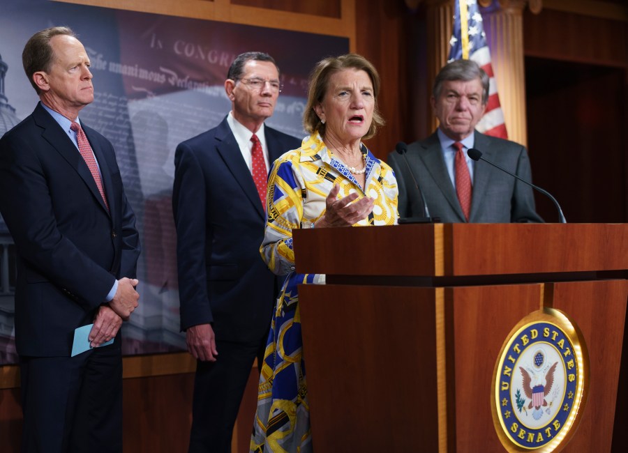 In this photo taken Thursday, May 27, 2021, Sen. Shelley Moore Capito, R-W.Va., the GOP's lead negotiator on a counteroffer to President Joe Biden's infrastructure plan, speaks at a news conference as she is joined by, from left, Sen. Pat Toomey, R-Pa., Sen. John Barrasso, R-Wyo., chairman of the Senate Republican Conference, and Sen. Roy Blunt, R-Mo., at the Capitol in Washington. Biden and the West Virginia senator will meet Wednesday afternoon to work on their differences. (AP Photo/J. Scott Applewhite)