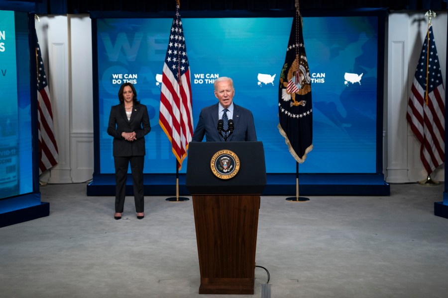 Vice President Kamala Harris listens as President Joe Biden speaks about the COVID-19 vaccination program, in the South Court Auditorium at the White House on June 2, 2021. (Evan Vucci/Associated Press)