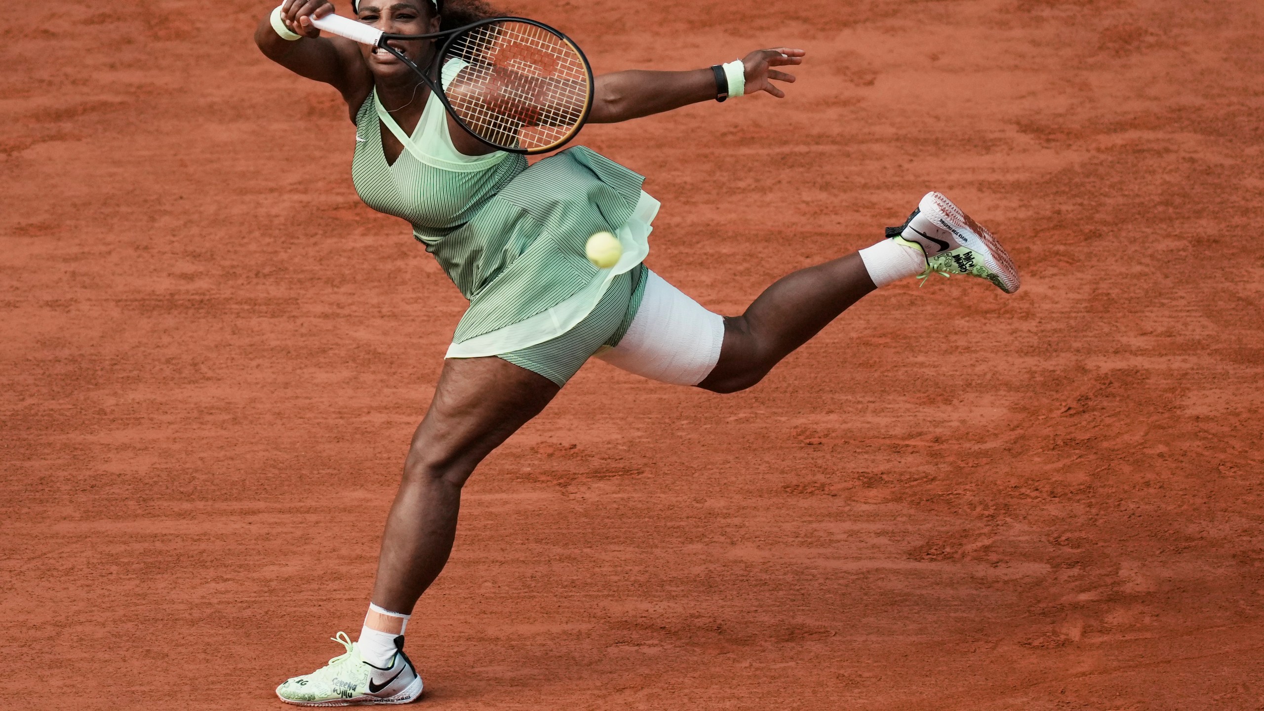 United States Serena Williams plays a return to Kazakhstan's Elena Rybakina during their fourth round match on day 8, of the French Open tennis tournament at Roland Garros in Paris, France, Sunday, June 6, 2021. (AP Photo/Thibault Camus)