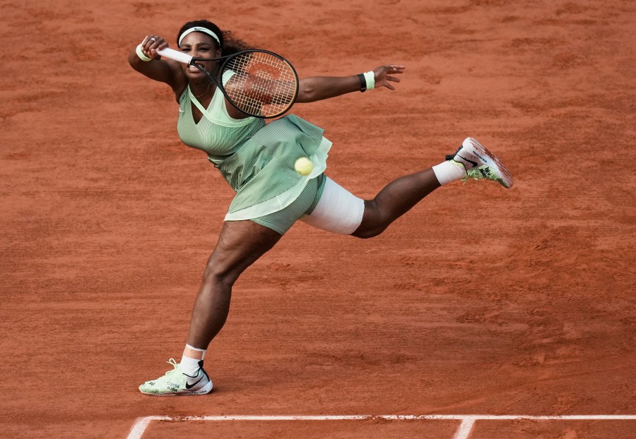 United States Serena Williams plays a return to Kazakhstan's Elena Rybakina during their fourth round match on day 8, of the French Open tennis tournament at Roland Garros in Paris, France, Sunday, June 6, 2021. (AP Photo/Thibault Camus)