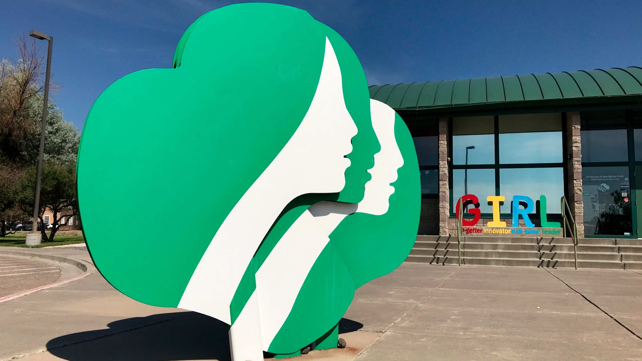 This June 7, 2021, image shows the headquarters of Girl Scouts of New Mexico Trails in Albuquerque, New Mexico. Rebecca Latham, CEO of Girl Scouts of New Mexico Trails, said her council had thousands of boxes left over at the end of the selling season in late spring, even though girls tried innovative selling methods like drive-thru booths and contact-free delivery. (AP Photo/Susan Montoya Bryan)