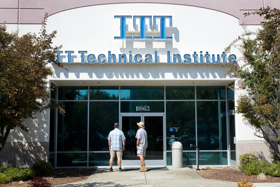 Students find the doors locked to the ITT Technical Institute campus in Rancho Cordova, Calif. (AP Photo/Rich Pedroncelli, File)