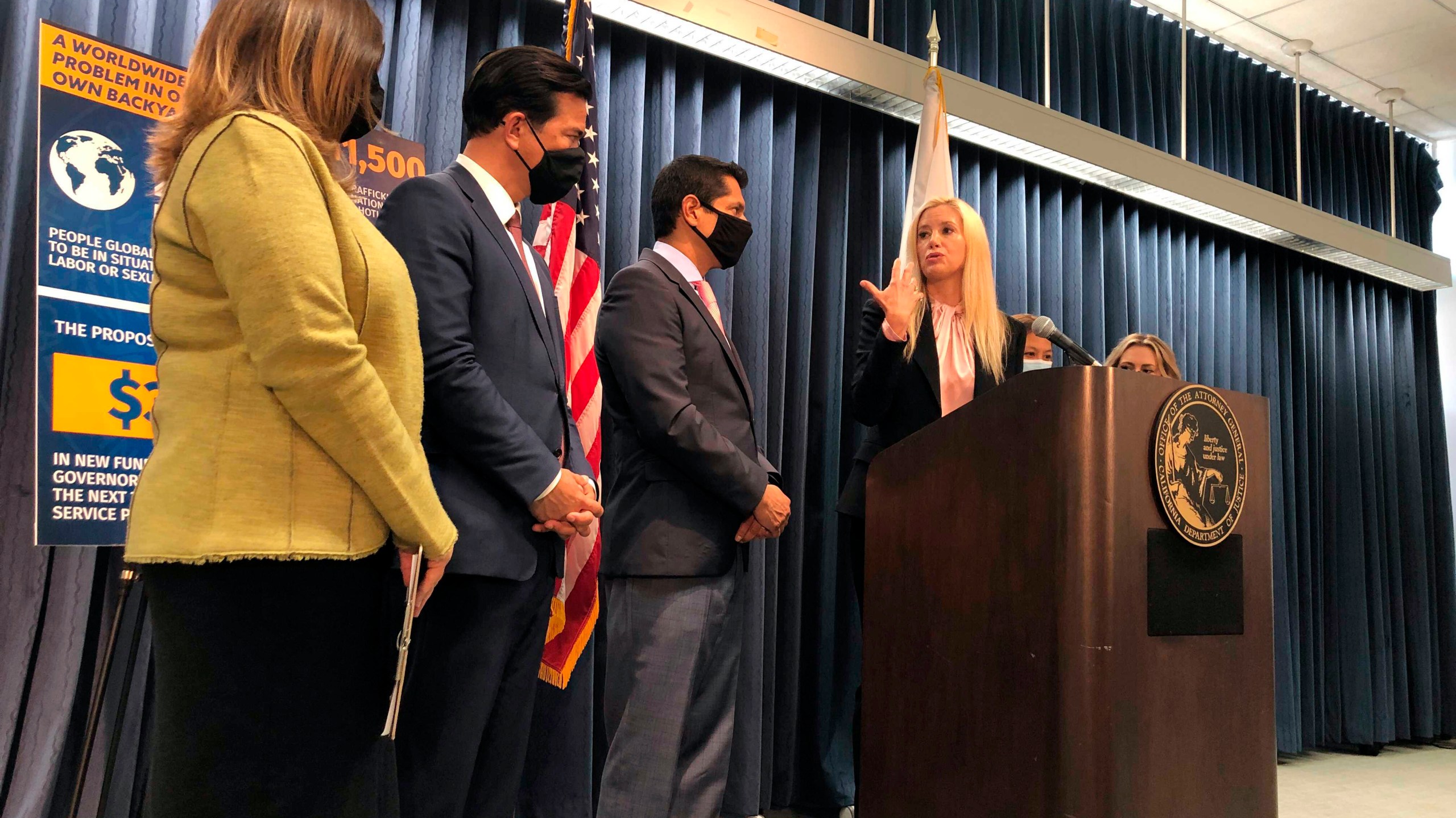 Actress Mira Sorvino at podium, joins actors and activists to discuss new efforts to stop human trafficking in California on Friday, June 18, 2021, in Los Angeles. (AP Photo/Stefanie Dazio)