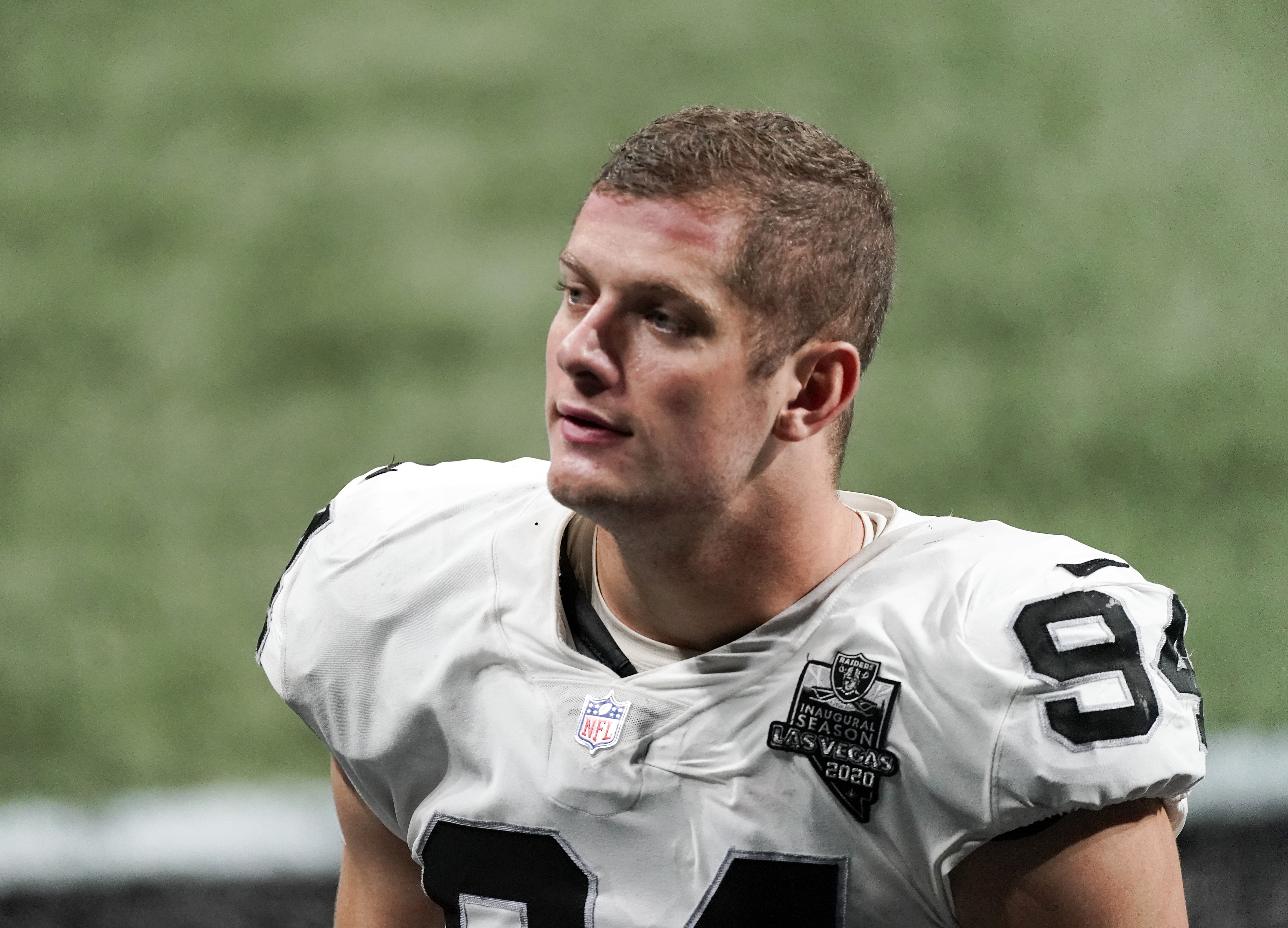 In this Nov. 29, 2020, file photo, Las Vegas Raiders defensive end Carl Nassib leaves the field after an NFL football game against the Atlanta Falcons in Atlanta. Nassib on Monday, June 21, 2021, became the first active NFL player to come out as gay. Nassib announced the news on Instagram, saying he was not doing it for the attention but because “I just think that representation and visibility are so important.” (AP Photo/John Bazemore, File)