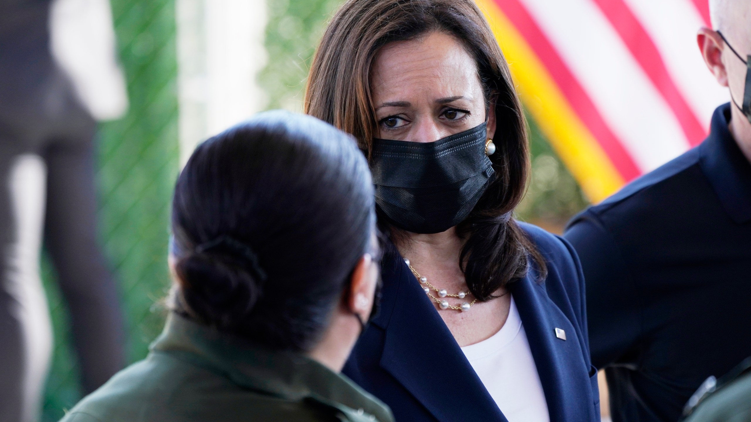 Vice President Kamala Harris talks to Gloria Chavez, Chief Patrol Agent of the El Paso Sector, as she tours the U.S. Customs and Border Protection Central Processing Center, Friday, June 25, 2021, in El Paso, Texas. (AP Photo/Jacquelyn Martin)