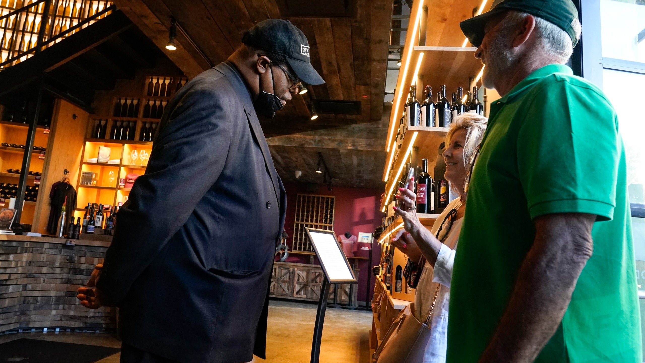 Security personnel ask customers for proof of vaccination as they enter City Winery, Thursday, June 24, 2021, in New York. (AP Photo/Frank Franklin II)