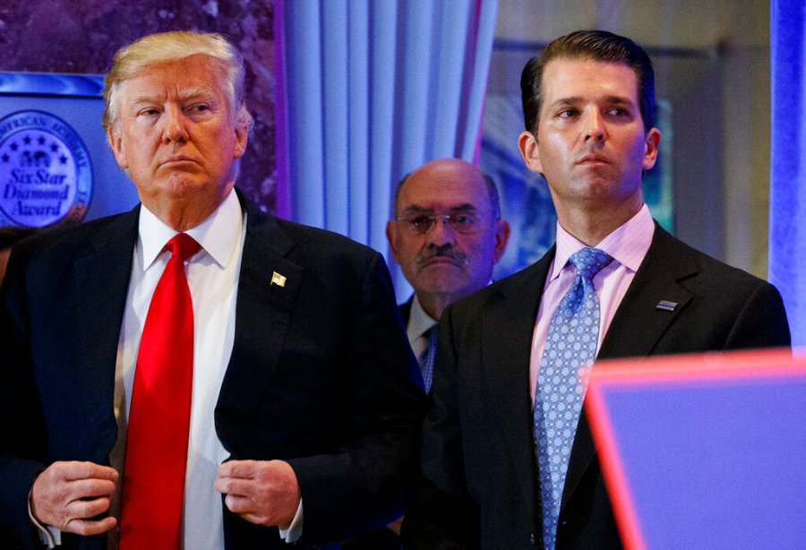 This file photo from Jan. 11, 2017, shows President-elect Donald Trump, left, his chief financial officer Allen Weisselberg, center, and his son Donald Trump Jr., right, attend a news conference in the lobby of Trump Tower in New York. (AP Photo/Evan Vucci, File)