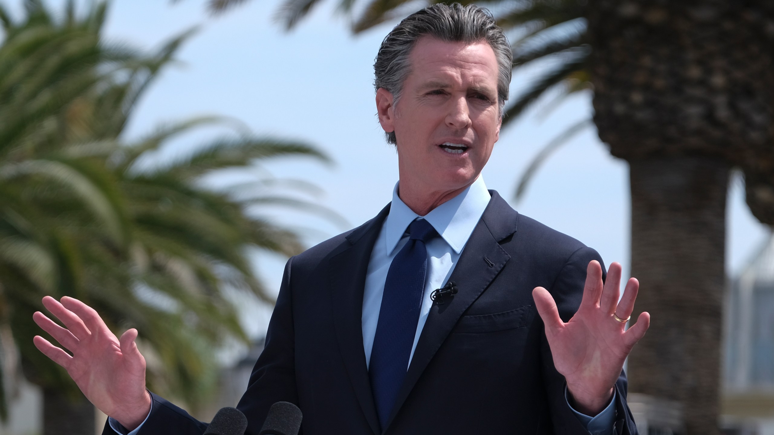 California Gov. Gavin Newsom talks during a news conference at Universal Studios Hollywood on June 25, 2021. (Ringo H.W. Chiu / Associated Press)