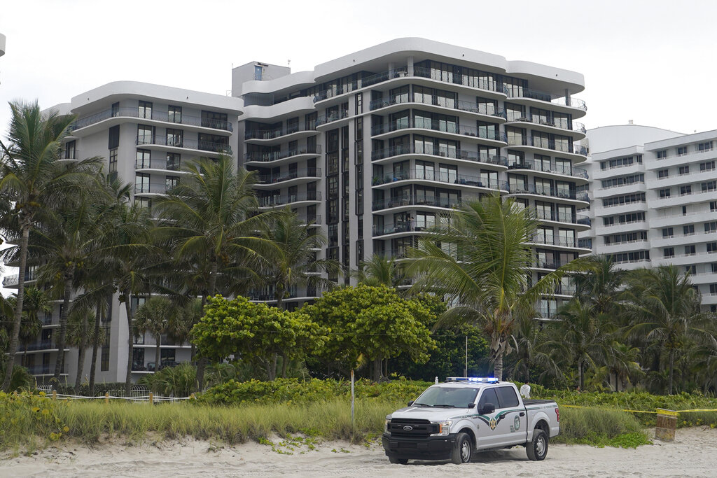 This Thursday, June 24, 2021, file photo, shows a sister building of a condominium that partially collapsed earlier the same day, in Surfside, Fla. (AP Photo/Wilfredo Lee, File)