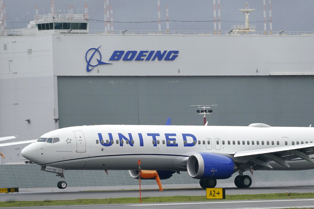 This Nov. 18, 2020, file photo shows a Boeing 737 Max 9 built for United Airlines landing at King County International Airport - Boeing Field after a test flight from Moses Lake, Wash., in Seattle. (AP Photo/Ted S. Warren, File)