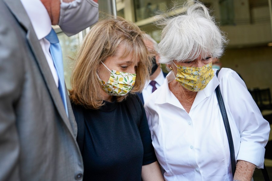 Allison Mack, center, leaves federal court with her mother, Mindy Mack, after being sentenced on June 30, 2021 in New York. (Mary Altaffer/Associated Press)