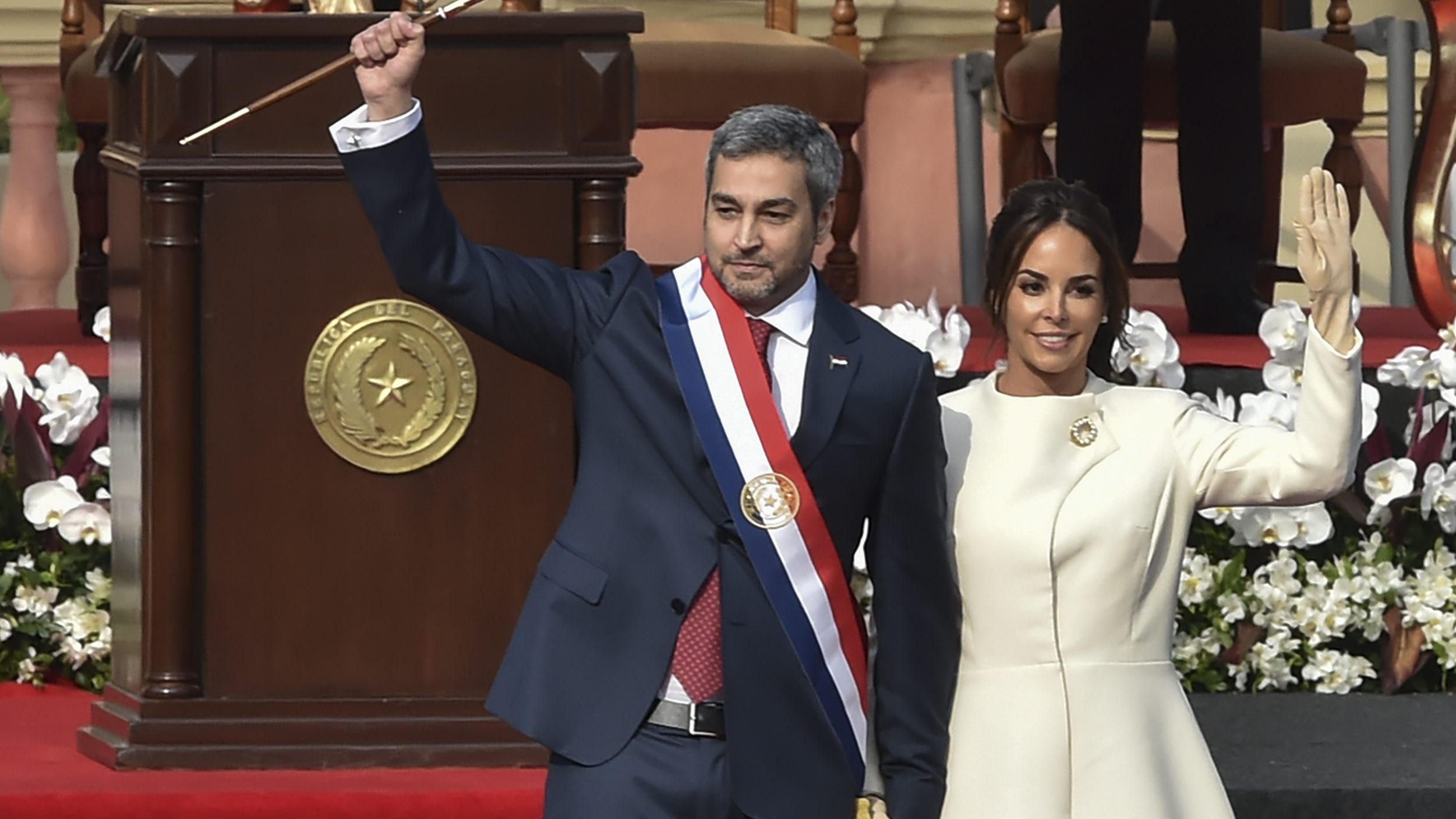 Paraguay's President Mario Abdo Benitez, left, walks next to his wife Silvana Lopez Moreira during his inauguration ceremony in Asuncion on Aug. 15, 2018.(Norberto Duarte / AFP / Getty Images)