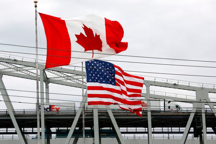 Vehicles cross the Blue Water Bridge over the St. Claire River to Port Huron, Michigan from Sarnia, Canada, on March 18, 2020 in Port Huron, Michigan. (JEFF KOWALSKY / AFP) (Photo by JEFF KOWALSKY/AFP via Getty Images)